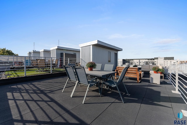 view of patio / terrace featuring a balcony