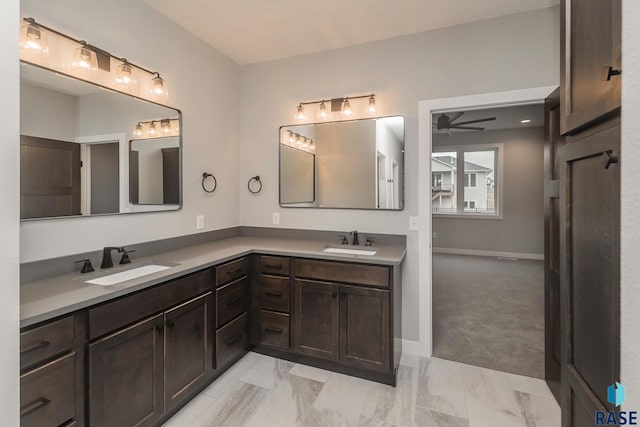 bathroom with vanity and ceiling fan