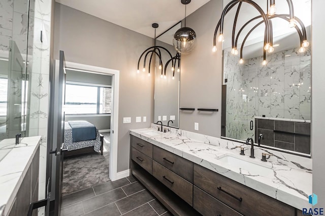 bathroom with tile patterned floors, vanity, and an enclosed shower