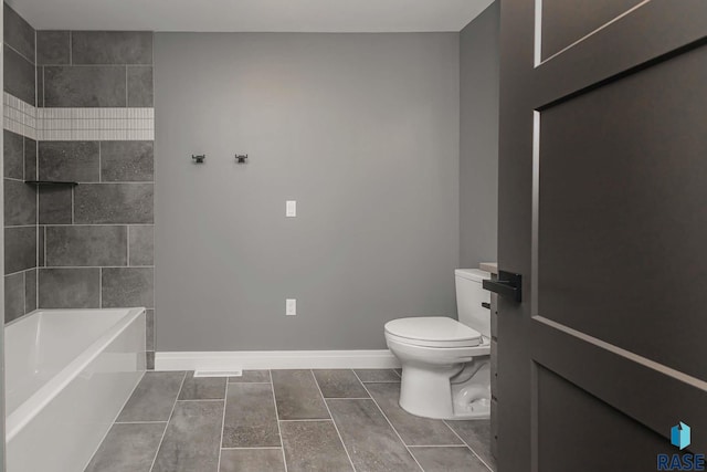 bathroom with a bathtub and toilet