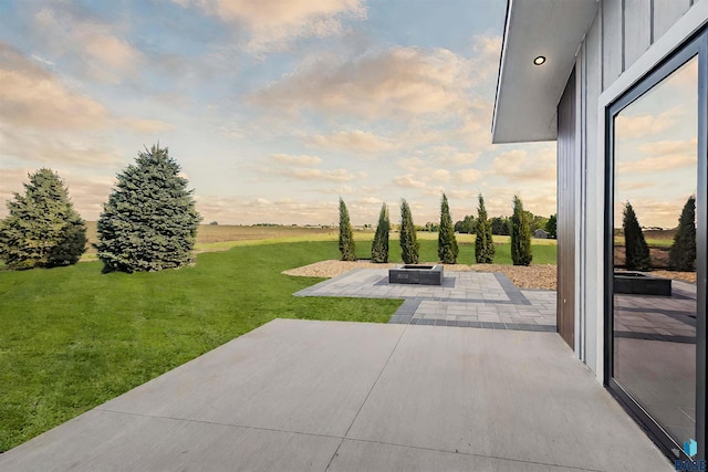 patio terrace at dusk with a yard