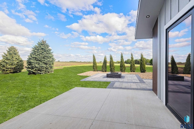 view of patio featuring a fire pit