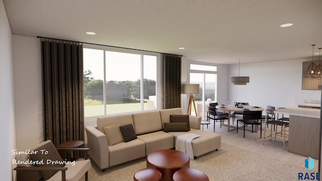 living room featuring light wood-style flooring and recessed lighting