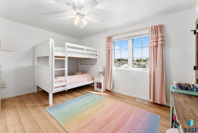 unfurnished bedroom featuring ceiling fan and wood-type flooring