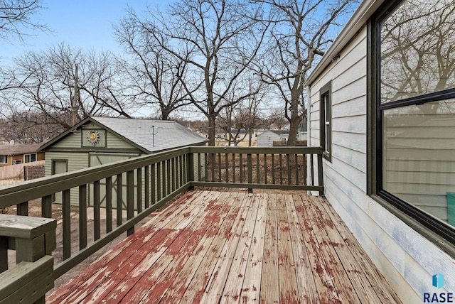 deck featuring an outdoor structure