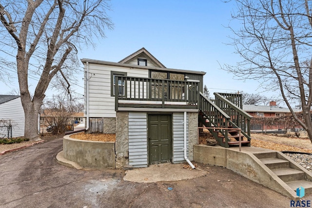 view of front of house featuring a deck