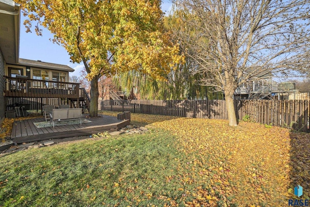 view of yard featuring a deck