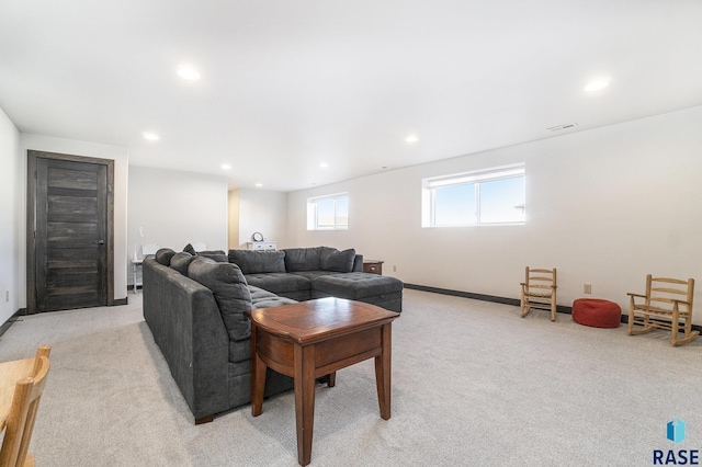 living room featuring light colored carpet