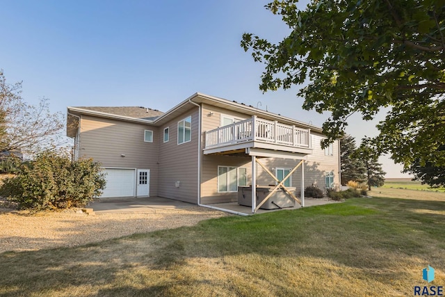 back of property featuring a garage, central AC unit, a deck, and a lawn