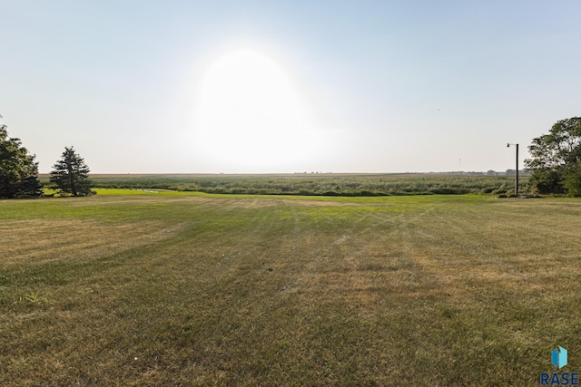 view of yard with a rural view