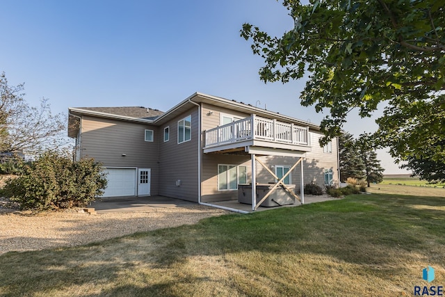 back of house with a garage, a wooden deck, a yard, and central air condition unit