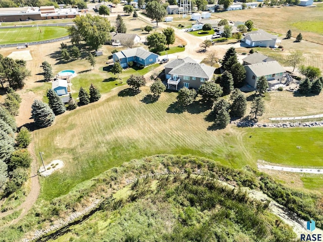 birds eye view of property featuring a rural view