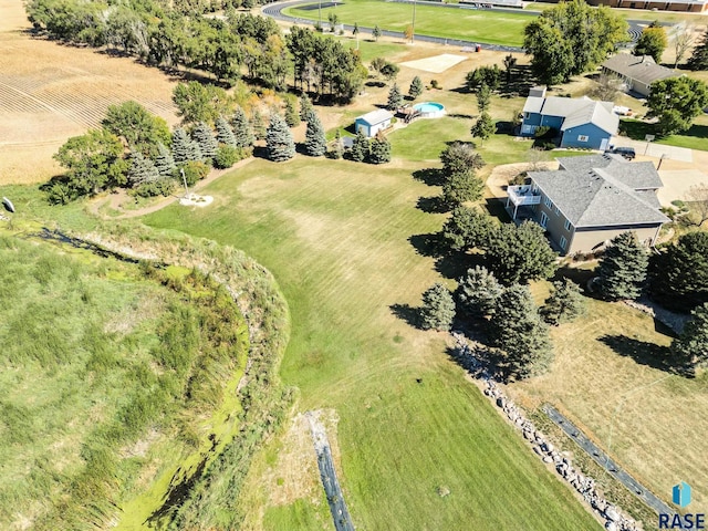 birds eye view of property featuring a rural view