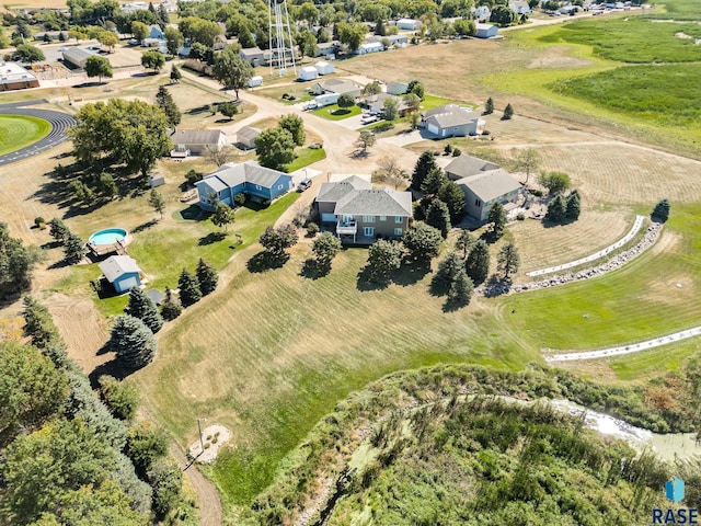 birds eye view of property featuring a rural view