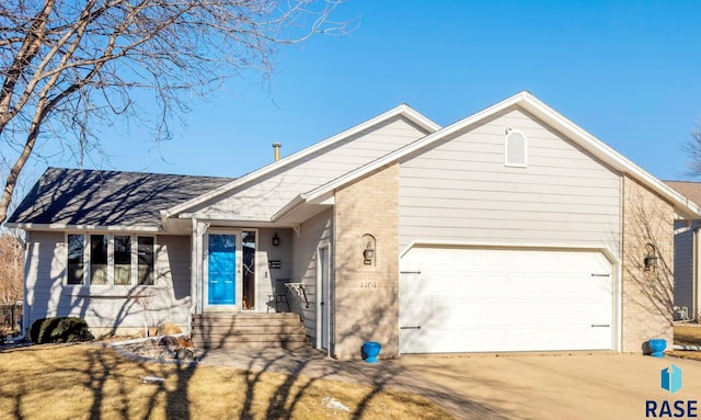 view of front of home with a garage