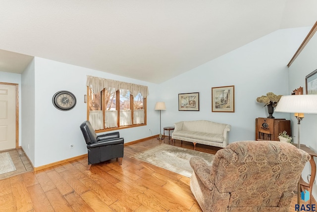 living room with lofted ceiling and light wood-type flooring