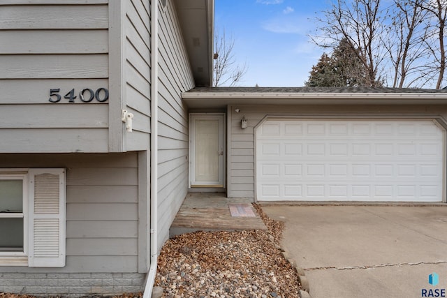 exterior space with a garage