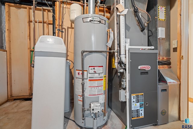 utility room featuring gas water heater and heating unit