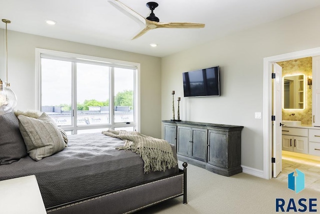 bedroom with light carpet, access to exterior, ceiling fan, and ensuite bathroom