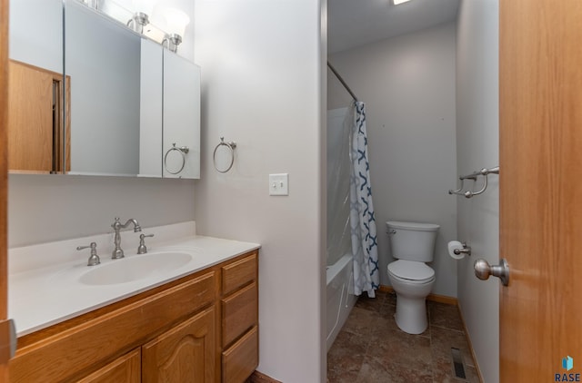 full bathroom with vanity, toilet, and shower / tub combo