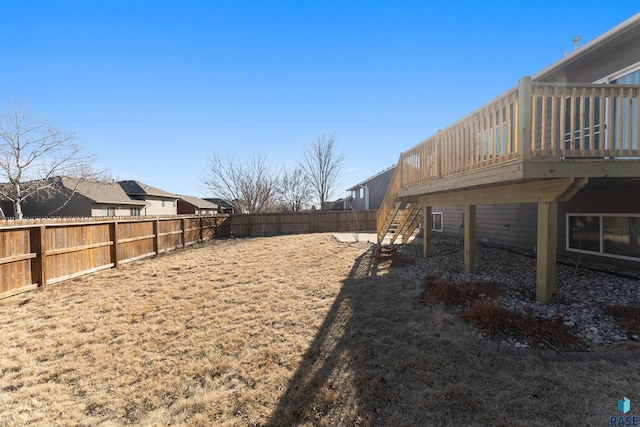 view of yard with a wooden deck