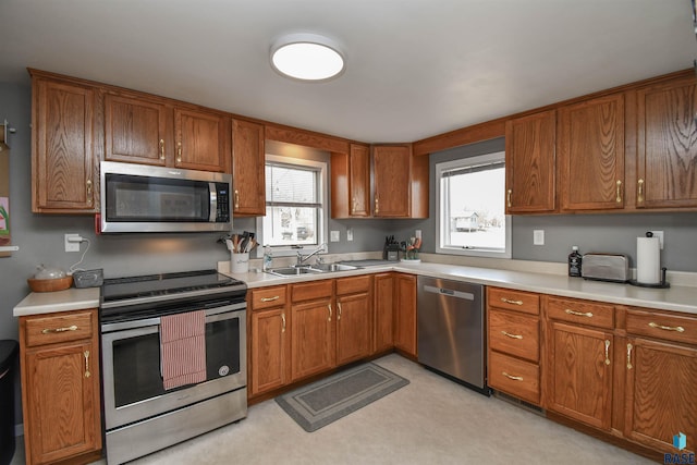 kitchen with appliances with stainless steel finishes and sink