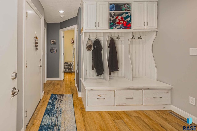 mudroom featuring light wood-type flooring