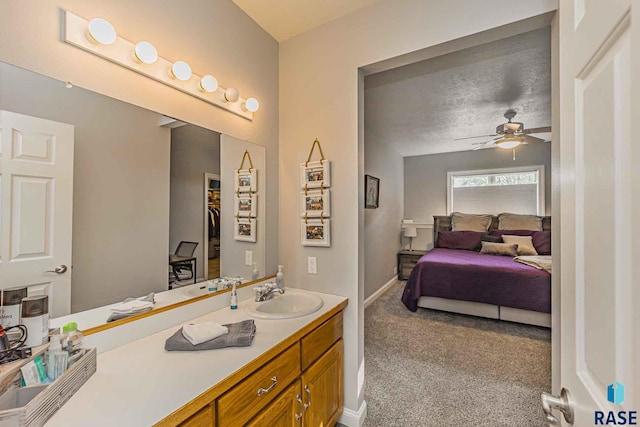 bathroom with vanity and ceiling fan