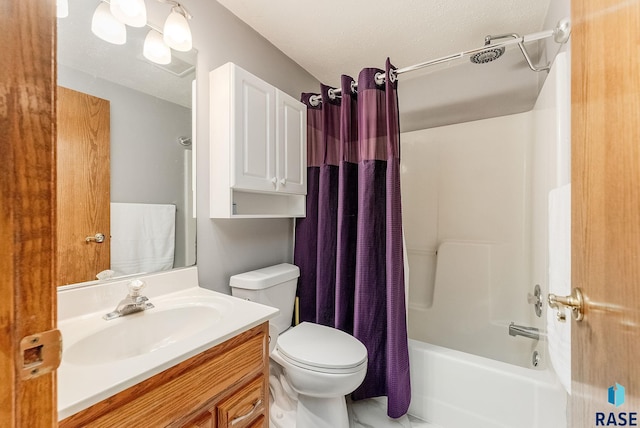 full bathroom with vanity, toilet, and shower / bath combo with shower curtain