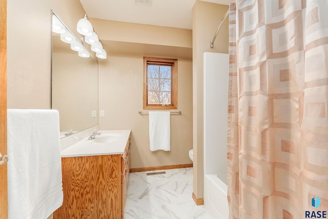 full bathroom featuring vanity, toilet, and shower / bath combo