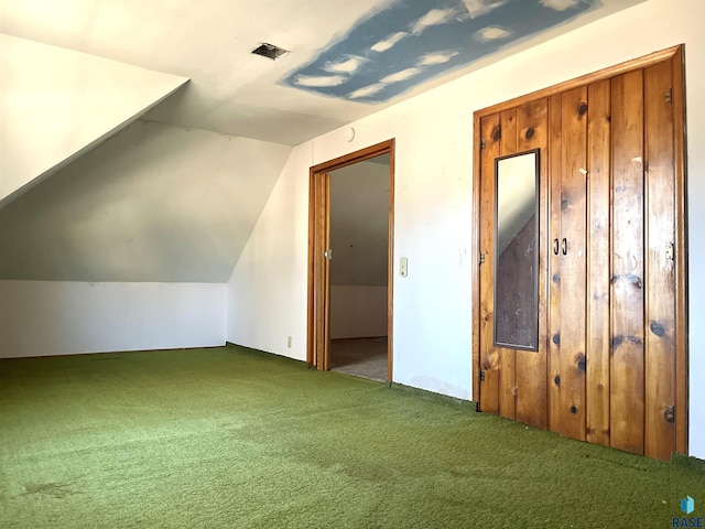 bonus room featuring carpet and lofted ceiling