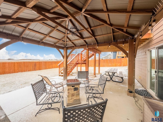 view of patio featuring a gazebo and ceiling fan