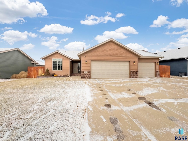 ranch-style home with a garage