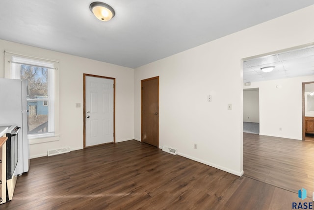 interior space with dark wood-type flooring