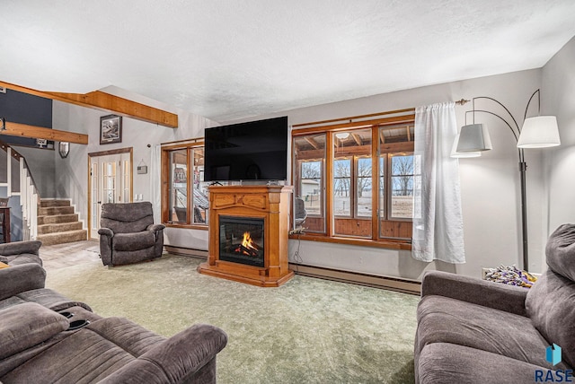 carpeted living room with a textured ceiling and a baseboard heating unit