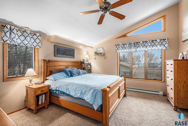 bedroom with lofted ceiling, light colored carpet, a textured ceiling, and baseboard heating