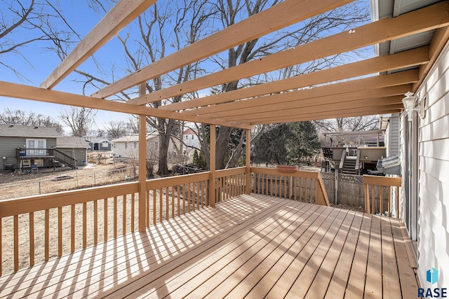 wooden deck with a pergola