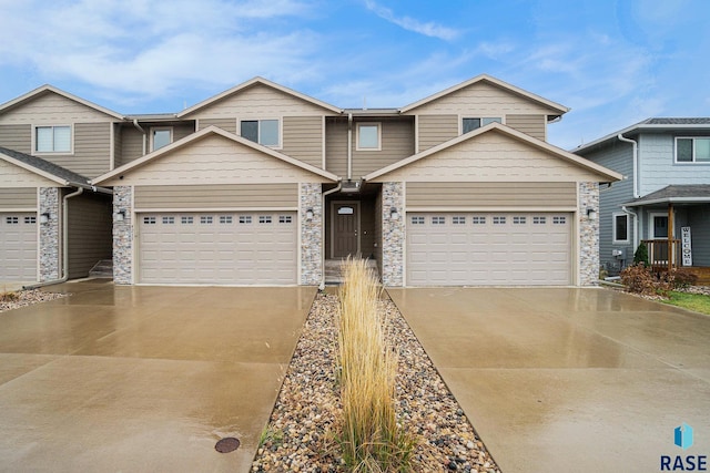 craftsman-style home with a garage