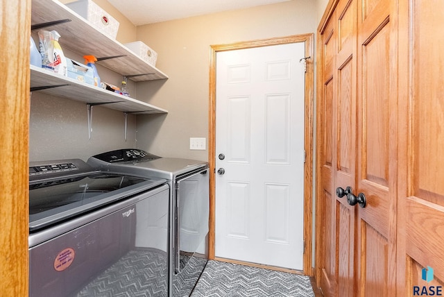 laundry room with washing machine and dryer