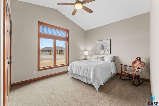 bedroom featuring vaulted ceiling, ceiling fan, and carpet