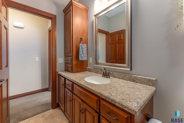 bathroom with vanity and tile patterned flooring