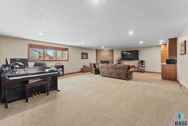 living room with a fireplace, light carpet, and a textured ceiling