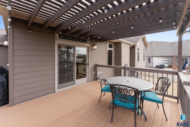 wooden terrace with a pergola