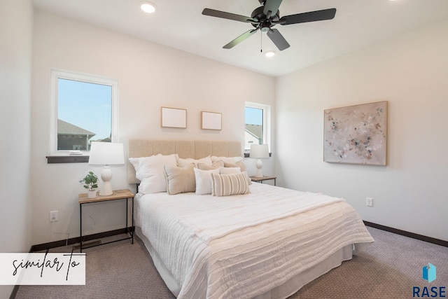 carpeted bedroom featuring ceiling fan