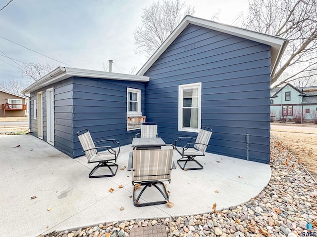 rear view of property with a patio area