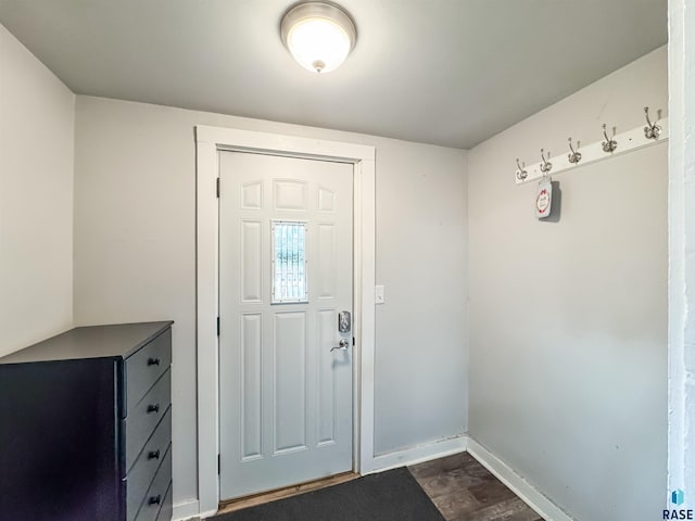 entrance foyer featuring dark hardwood / wood-style flooring