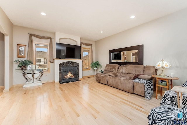 living room featuring hardwood / wood-style flooring and a wealth of natural light