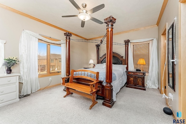 bedroom featuring ornamental molding, light carpet, and ceiling fan