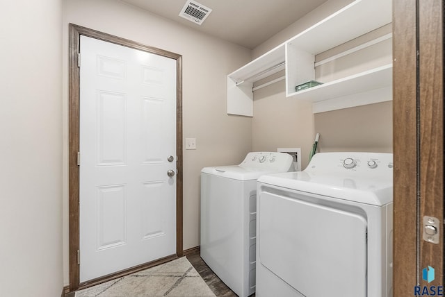 washroom featuring independent washer and dryer