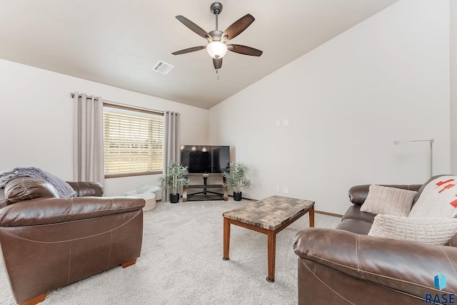 carpeted living room with vaulted ceiling and ceiling fan